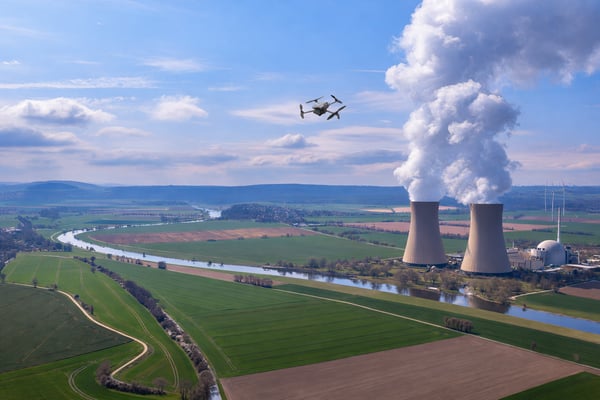 Drone flying over power plant